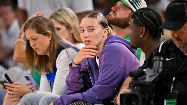 Oct 6, 2025; Fort Worth, Texas, USA; Dallas Wings guard Paige Bueckers looks on during the second quarter between the Dallas Mavericks and the Oklahoma City Thunder at Dickie's Arena. Mandatory Credit: Jerome Miron-Imagn Images Oct 6, 2025; Fort Worth, Texas, USA; Dallas Wings guard Paige Bueckers looks on during the second quarter between the Dallas Mavericks and the Oklahoma City Thunder at Dickie's Arena. Mandatory Credit: Jerome Miron-Imagn Images