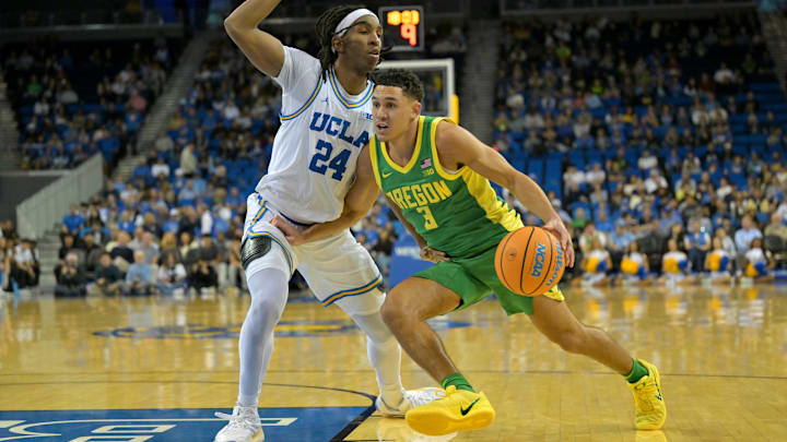 Dec 6, 2025; Los Angeles, California, USA;  UCLA Bruins forward Steven Jamerson II (24) guards Oregon Ducks guard Jackson Shelstad (3) during the second half at Pauley Pavilion presented by Wescom Financial. Mandatory Credit: Jayne Kamin-Oncea-Imagn Images