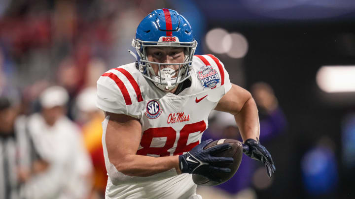 Dec 30, 2023; Atlanta, GA, USA; Mississippi Rebels tight end Caden Prieskorn (86) runs for a touchdown after catching a pass against the Penn State Nittany Lions during the first half at Mercedes-Benz Stadium. Mandatory Credit: Dale Zanine-USA TODAY Sports