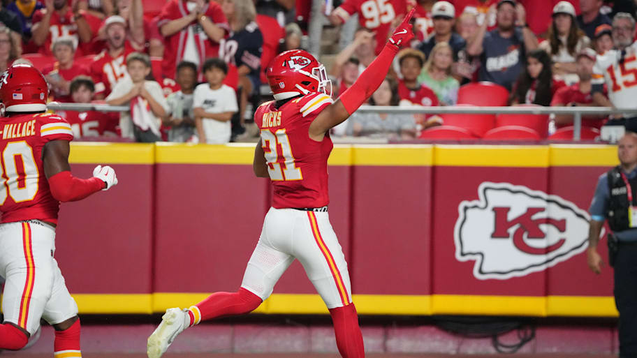 Aug 22, 2024; Kansas City, Missouri, USA; Kansas City Chiefs safety Jaden Hicks (21) celebrates against the Chicago Bears after recovering a fumble during the first half at GEHA Field at Arrowhead Stadium. Mandatory Credit: Denny Medley-Imagn Images | Denny Medley-Imagn Images