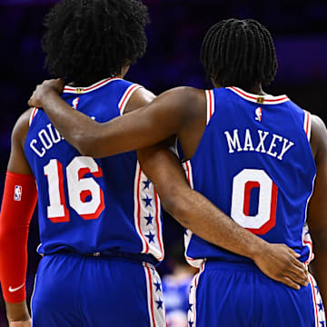 Feb 14, 2024; Philadelphia, Pennsylvania, USA; Philadelphia 76ers guard Ricky Council IV (16) stands with guard Tyrese Maxey (0) against the Miami Heat in the third quarter at Wells Fargo Center. Mandatory Credit: Kyle Ross-Imagn Images