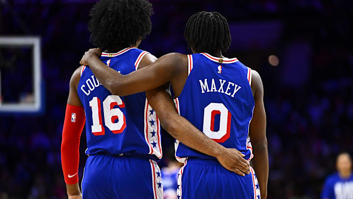 Feb 14, 2024; Philadelphia, Pennsylvania, USA; Philadelphia 76ers guard Ricky Council IV (16) stands with guard Tyrese Maxey (0) against the Miami Heat in the third quarter at Wells Fargo Center. Mandatory Credit: Kyle Ross-Imagn Images