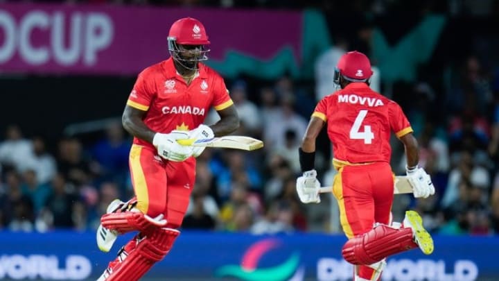 Canada’s Shreyas Movva, right, runs with teammate Dilon Heyliger during the men’s World Cup cricket match against Netherlands