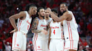 Houston basketball players huddle up during a recent game.