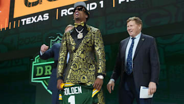 Apr 24, 2025; Green Bay, WI, USA; NFL commissioner Roger Goodell and Green Bay Packers president Mark Murphy with Texas Longhorns wide receiver Matthew Golden after he is selected by the Green Bay Packers as the number 23 pick in the first round of the 2025 NFL Draft at Lambeau Field. Mandatory Credit: Kirby Lee-Imagn Images