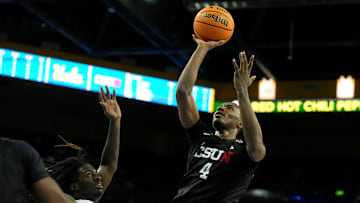 Dec 19, 2023; Los Angeles, California, USA; Cal State Northridge Matadors guard Keonte Jones (4) shoots the ball against the UCLA Bruins in the first half at Pauley Pavilion presented by Wescom. Mandatory Credit: Kirby Lee-Imagn Images