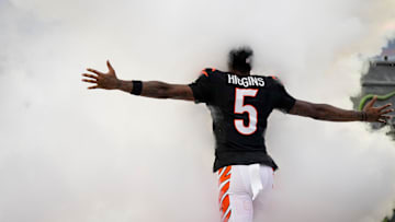 Cincinnati Bengals wide receiver Tee Higgins (5) runs on the field as he’s introduced before the first quarter of the NFL Week 17 game between the Cincinnati Bengals and the Denver Broncos at Paycor Stadium in downtown Cincinnati on Saturday, Dec. 28, 2024.