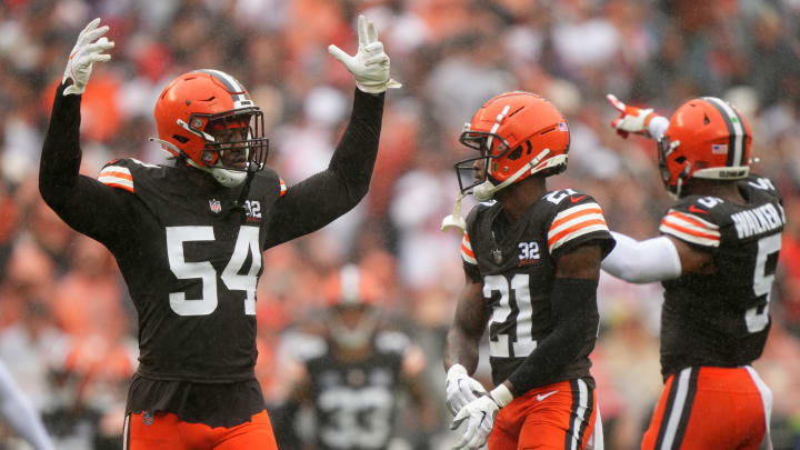 Browns defensive end Ogbo Okoronkwo (54) fires up the crowd after the Cincinnati Bengals committed a false start in the second quarter, Sunday, Sept. 10, 2023, in Cleveland.