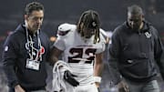 Nov 30, 2025; Indianapolis, Indiana, USA; Houston Texans safety Jaylen Reed (23) is helped off the field following an injury during a game against the Indianapolis Colts at Lucas Oil Stadium. Mandatory Credit: Grace Hollars-USA TODAY Network via Imagn Images