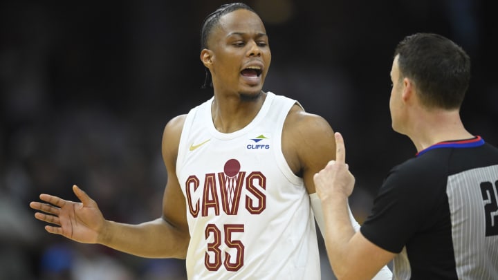 Apr 20, 2024; Cleveland, Ohio, USA; Cleveland Cavaliers forward Isaac Okoro (35) talks with referee Mark Lindsay (29) in the second quarter against the Orlando Magic during game one of the first round for the 2024 NBA playoffs at Rocket Mortgage FieldHouse. Mandatory Credit: David Richard-USA TODAY Sports