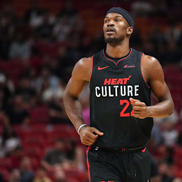 Nov 16, 2023; Miami, Florida, USA; Miami Heat forward Jimmy Butler (22) makes his way up the court against the Brooklyn Nets in the first half at Kaseya Center. Mandatory Credit: Jim Rassol-Imagn Images