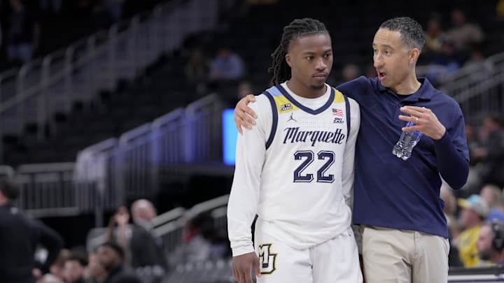 Marquette guard Sean Jones (22) 