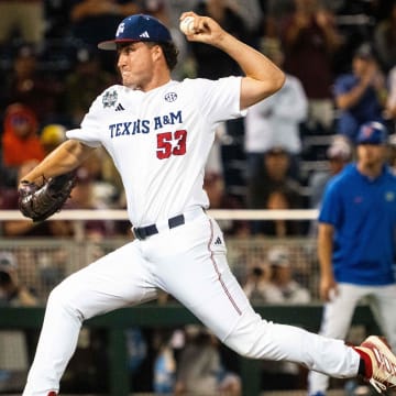 Jun 15, 2024; Omaha, NE, USA; Texas A&M Aggies pitcher Evan Aschenbeck (53) pitches against the Florida Gators during the eighth inning at Charles Schwab Field Omaha. Mandatory Credit: Dylan Widger-USA TODAY Sports