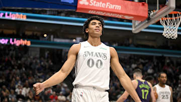 Feb 21, 2025; Dallas, Texas, USA; Dallas Mavericks guard Max Christie (00) reacts to a call during the second quarter against the New Orleans Pelicans at the American Airlines Center. Mandatory Credit: Jerome Miron-Imagn Images