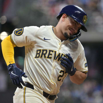 Jul 29, 2024; Milwaukee, Wisconsin, USA; Milwaukee Brewers shortstop Willy Adames (27) rounds the bases after hitting a home run against the Atlanta Braves in the sixth inning at American Family Field. 