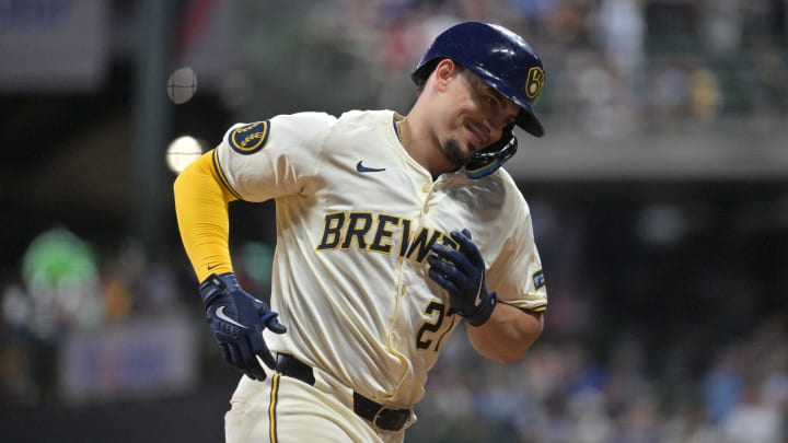 Jul 29, 2024; Milwaukee, Wisconsin, USA; Milwaukee Brewers shortstop Willy Adames (27) rounds the bases after hitting a home run against the Atlanta Braves in the sixth inning at American Family Field. 