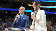 Apr 6, 2025; Tampa, FL, USA; ESPN announcers Ryan Ruocco and Rebecca Lobo look on before the national championship of the women's 2025 NCAA tournament between the South Carolina Gamecocks and the Connecticut Huskies at Amalie Arena. Mandatory Credit: Kirby Lee-Imagn Images