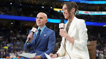 Apr 6, 2025; Tampa, FL, USA; ESPN announcers Ryan Ruocco and Rebecca Lobo look on before the national championship of the women's 2025 NCAA tournament between the South Carolina Gamecocks and the Connecticut Huskies at Amalie Arena. Mandatory Credit: Kirby Lee-Imagn Images