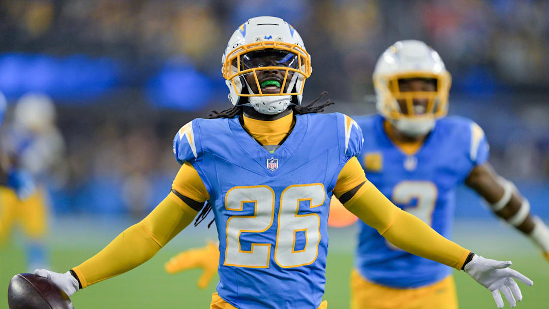 Nov 9, 2025; Inglewood, California, USA; Los Angeles Chargers cornerback Donte Jackson (26) celebrates after an interception against the Pittsburgh Steelers during the fourth quarter of the game at SoFi Stadium. Mandatory Credit: Jayne Kamin-Oncea-Imagn Images