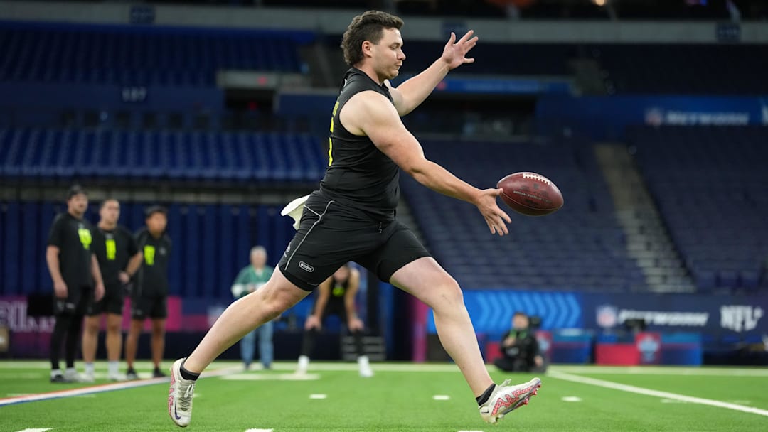 Feb 25, 2026; Indianapolis, IN, USA; Brett Thorson of Georgia punts the ball during the NFL Scouting Combine at Lucas Oil Stadium. Mandatory Credit: Kirby Lee-Imagn Images