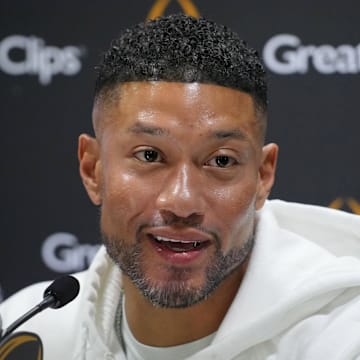 Jan 18, 2025; Atlanta, GA, USA; Notre Dame Fighting Irish head coach Marcus Freeman talks to the media during 2025 CFP National Championship Media Day at Georgia World Congress Center, Building A. 