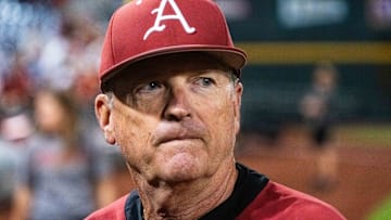 Jun 17, 2025; Omaha, Neb, USA; Arkansas Razorbacks head coach Dave Van Horn walks off the field after defeating the UCLA Bruins at Charles Schwab Field. Mandatory Credit: Dylan Widger-Imagn Images