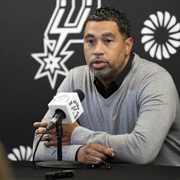 Nov 13, 2024; San Antonio, Texas, USA; San Antonio Spurs general manager Brian Wright speaks with the media about the health and absence of head coach Gregg Popovich before a game against the Washington Wizards at Frost Bank Center.