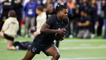 Apr 4, 2025; Boulder, CO, USA; Colorado Buffaloes wide receiver Travis Hunter (12) runs drills at the University of Colorado NFL Showcase at the CU Indoor Practice Facility. Mandatory Credit: Michael Ciaglo-Imagn Images