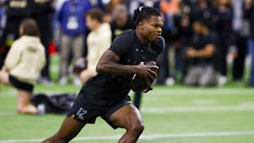 Apr 4, 2025; Boulder, CO, USA; Colorado Buffaloes wide receiver Travis Hunter (12) runs drills at the University of Colorado NFL Showcase at the CU Indoor Practice Facility. Mandatory Credit: Michael Ciaglo-Imagn Images