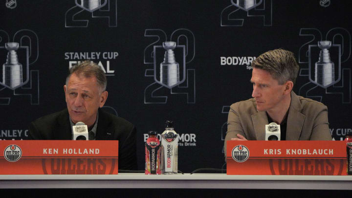 Jun 7, 2024; Sunrise, Florida, USA; Edmonton Oilers general manager Ken Holland, left, and head coach Kris Knoblauch take questions during media day in advance of the 2024 Stanley Cup Final at Amerant Bank Arena. Mandatory Credit: Jim Rassol-USA TODAY Sports