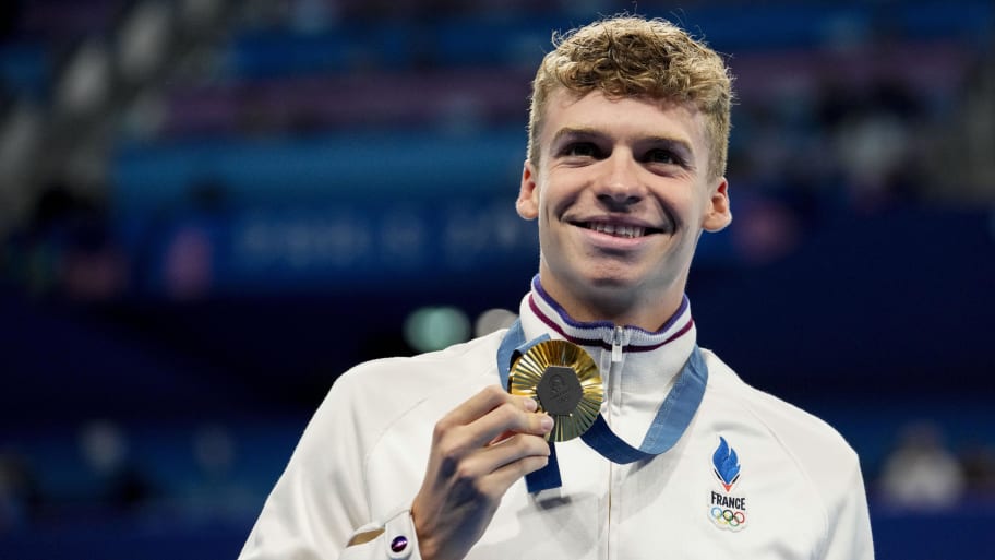 Leon Marchand (France) in the men’s 200-meter individual medley medal ceremony during the Paris 2024 Olympic Summer Games.