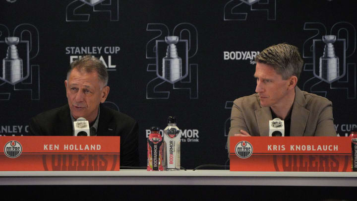 Jun 7, 2024; Sunrise, Florida, USA; Edmonton Oilers general manager Ken Holland, left, and head coach Kris Knoblauch take questions during media day in advance of the 2024 Stanley Cup Final at Amerant Bank Arena. Mandatory Credit: Jim Rassol-USA TODAY Sports