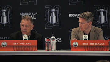 Jun 7, 2024; Sunrise, Florida, USA; Edmonton Oilers general manager Ken Holland, left, and head coach Kris Knoblauch take questions during media day in advance of the 2024 Stanley Cup Final at Amerant Bank Arena. Mandatory Credit: Jim Rassol-Imagn Images