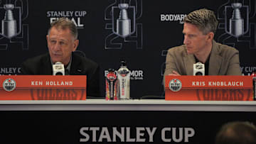 Jun 7, 2024; Sunrise, Florida, USA; Edmonton Oilers general manager Ken Holland, left, and head coach Kris Knoblauch take questions during media day in advance of the 2024 Stanley Cup Final at Amerant Bank Arena. Mandatory Credit: Jim Rassol-Imagn Images