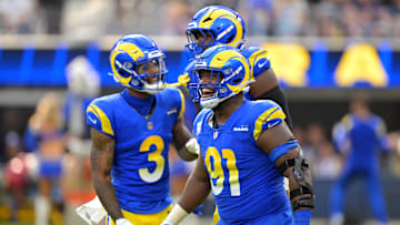 Sep 28, 2025; Inglewood, California, USA; Los Angeles Rams defensive end Kobie Turner (91) reacts after a sack of Indianapolis Colts quarterback Daniel Jones (17) in the second half at SoFi Stadium. 