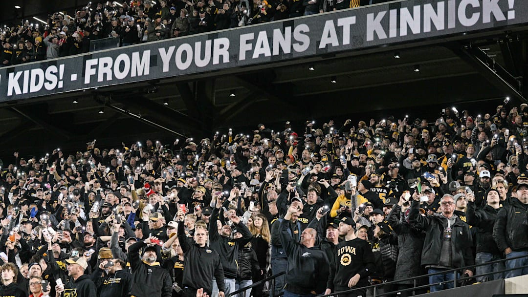 Nov 2, 2024; Iowa City, Iowa, USA; Fans conduct the Iowa Wave before the second quarter of the game between the Iowa Hawkeyes and the Wisconsin Badgers at Kinnick Stadium. Mandatory Credit: Jeffrey Becker-Imagn Images