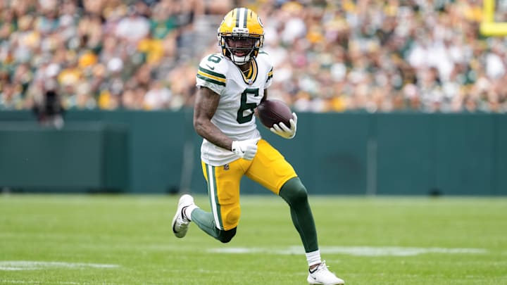Aug 23, 2025; Green Bay, Wisconsin, USA;  Green Bay Packers wide receiver Mecole Hardman (6) rushes with the football during the second quarter against the Seattle Seahawks at Lambeau Field. Mandatory Credit: Jeff Hanisch-Imagn Images