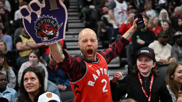 Mar 3, 2024; Toronto, Ontario, CAN; A Toronto Raptors fan reacts during a time out against the Charlotte Hornets in the second half at Scotiabank Arena. Mandatory Credit: Dan Hamilton-USA TODAY Sports