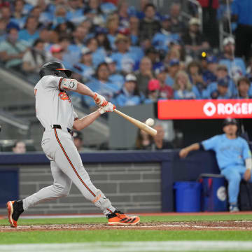 Aug 7, 2024; Toronto, Ontario, CAN; Baltimore Orioles second baseman Jackson Holliday (7) hits a two run home run against the Toronto Blue Jays during the seventh inning at Rogers Centre.