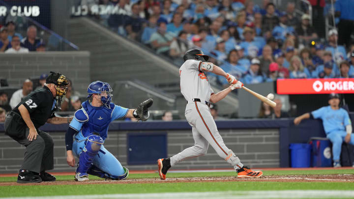 Aug 7, 2024; Toronto, Ontario, CAN; Baltimore Orioles second baseman Jackson Holliday (7) hits a two run home run against the Toronto Blue Jays during the seventh inning at Rogers Centre.