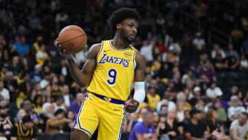 Oct 4, 2024; Palm Desert, California, USA; Los Angeles Lakers guard Bronny James (9) looks to pass against the Minnesota Timberwolves during the second half at Acrisure Arena. Mandatory Credit: Jonathan Hui-Imagn Images