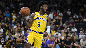 Oct 4, 2024; Palm Desert, California, USA; Los Angeles Lakers guard Bronny James (9) looks to pass against the Minnesota Timberwolves during the second half at Acrisure Arena. Mandatory Credit: Jonathan Hui-Imagn Images