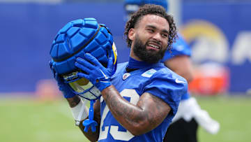 May 28, 2025; Woodland Hills, CA, USA; Los Angeles Rams running back Kyren Williams (23) takes a break during organized team activities at Rams Practice Facility. Mandatory Credit: Kirby Lee-Imagn Images