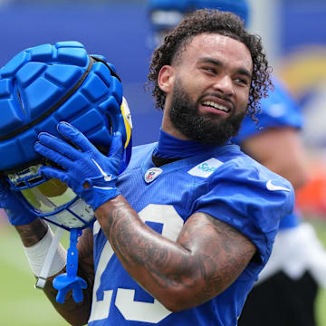 May 28, 2025; Woodland Hills, CA, USA; Los Angeles Rams running back Kyren Williams (23) takes a break during organized team activities at Rams Practice Facility. Mandatory Credit: Kirby Lee-Imagn Images