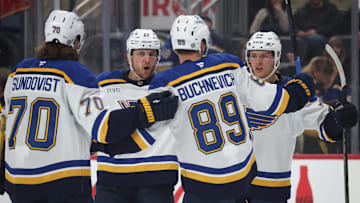 Mar 13, 2025; Pittsburgh, Pennsylvania, USA;  St. Louis Blues center Oskar Sundqvist (70) and defenseman Cam Fowler (17) and left wing Pavel Buchnevich (89) celebrate with center Zack Bolduc (right) after Bolduc scored a gaol against the Pittsburgh Penguins during the second period at PPG Paints Arena. Mandatory Credit: Charles LeClaire-Imagn Images