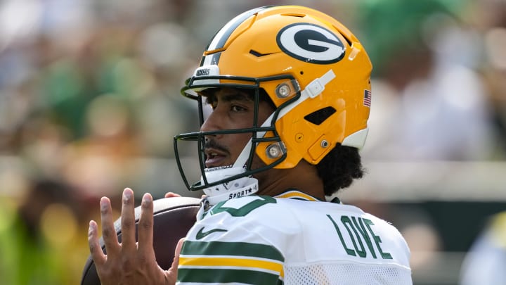 Aug 24, 2024; Green Bay, Wisconsin, USA;  Green Bay Packers quarterback Jordan Love (10) throws a pass during warmups prior to the game against the Baltimore Ravens at Lambeau Field. Mandatory Credit: Jeff Hanisch-USA TODAY Sports