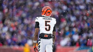 Cincinnati Bengals wide receiver Tee Higgins (5) walks for the sideline after hitting his head for a second time in the fourth quarter of the NFL Week 14 game between the Buffalo Bills and the Cincinnati Bengals at Highmark Stadium in Orchard Park, N.Y., on Sunday, Dec. 7, 2025. The Bills overcame a halftime deficit to win 39-34.