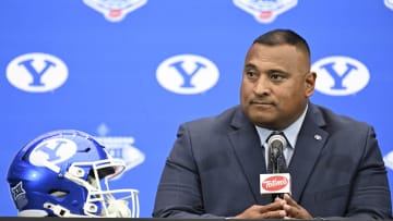 BYU's head coach, Kalani Sitake, sits for a press conference at the Big 12 media day