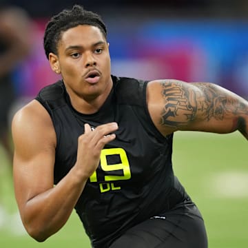 Feb 27, 2025; Indianapolis, IN, USA; Georgia defensive lineman Tyrion Ingram-Dawkins (DL19) participates in drills during the 2025 NFL Combine at Lucas Oil Stadium.