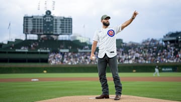 Jake Arrieta throws out the first pitch at Wrigley Field prior to a Chicago Cubs v Chicago White Sox game.